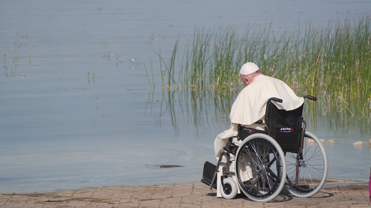 Pope Francis prays from his wheelchair on the shores of Lac Ste Anne during his 2022 visit to Canada