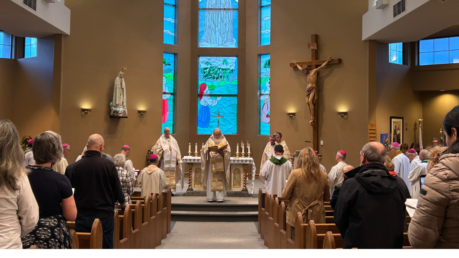 Bishops, clergy, and faithful gather for a solemn Mass, uniting in prayer and worship during the conference.