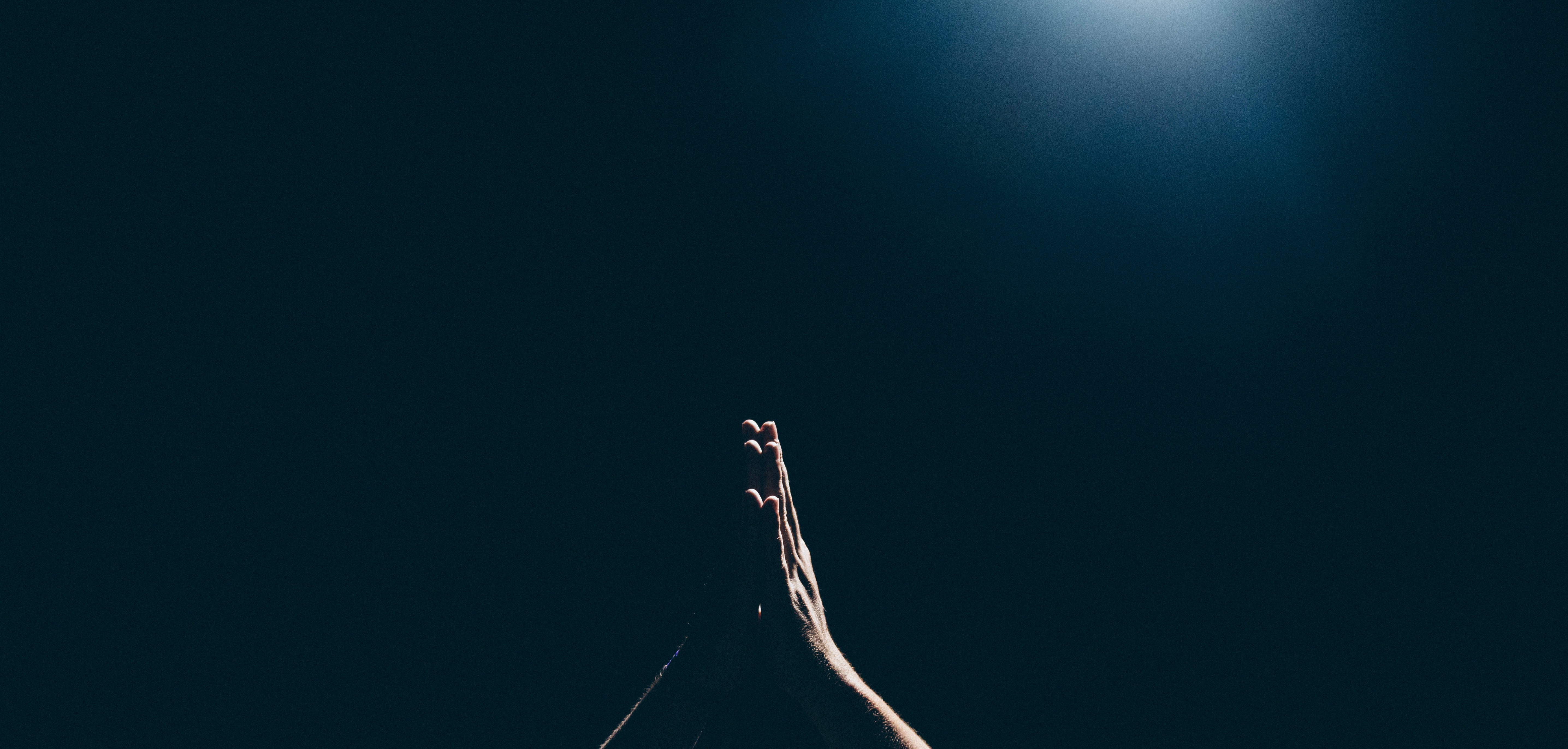 Praying hands - photo by Amaury Gutierrez on Unsplash